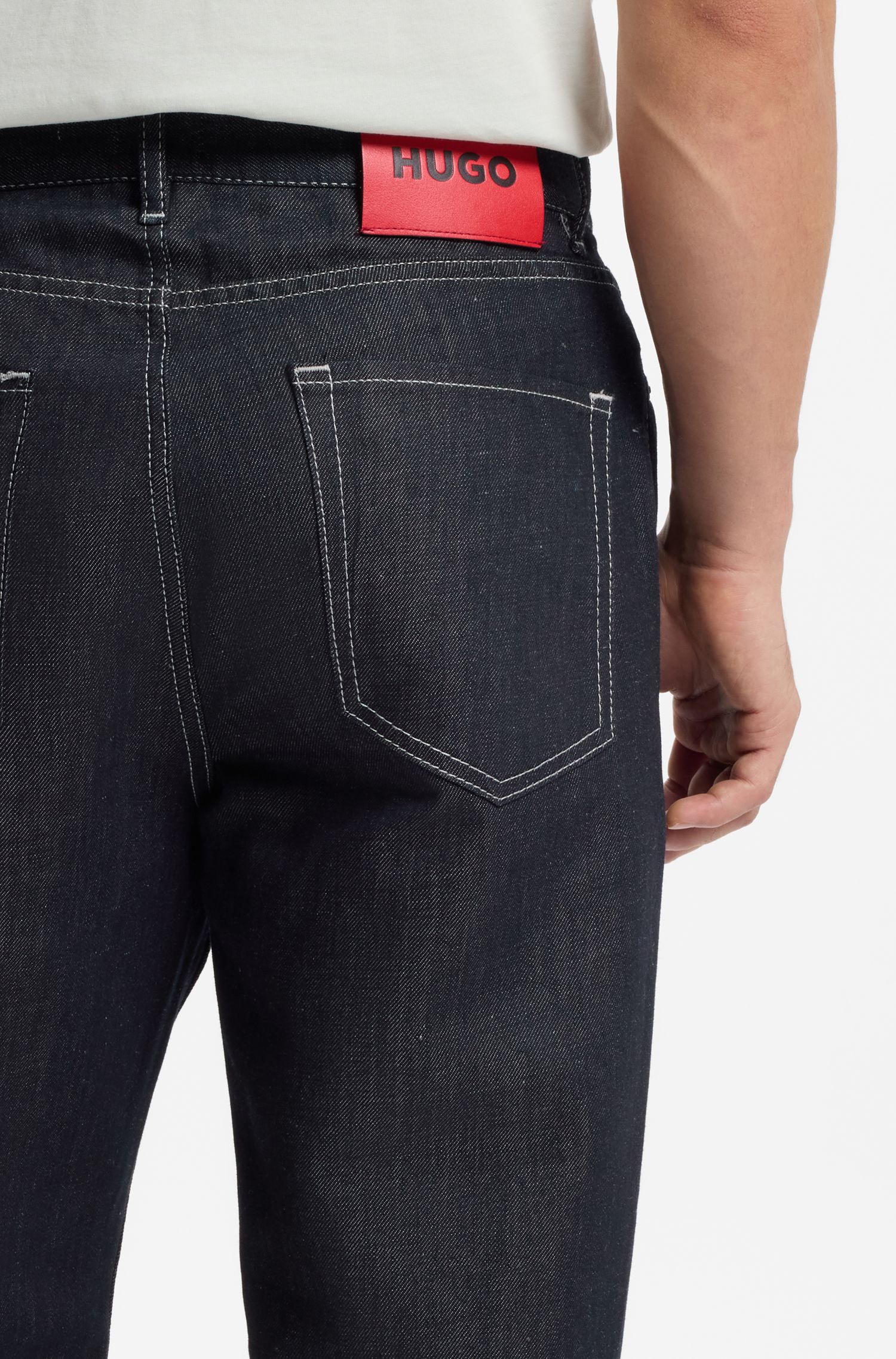 【HUGO雨果】深蓝色复古水洗锥形牛仔裤